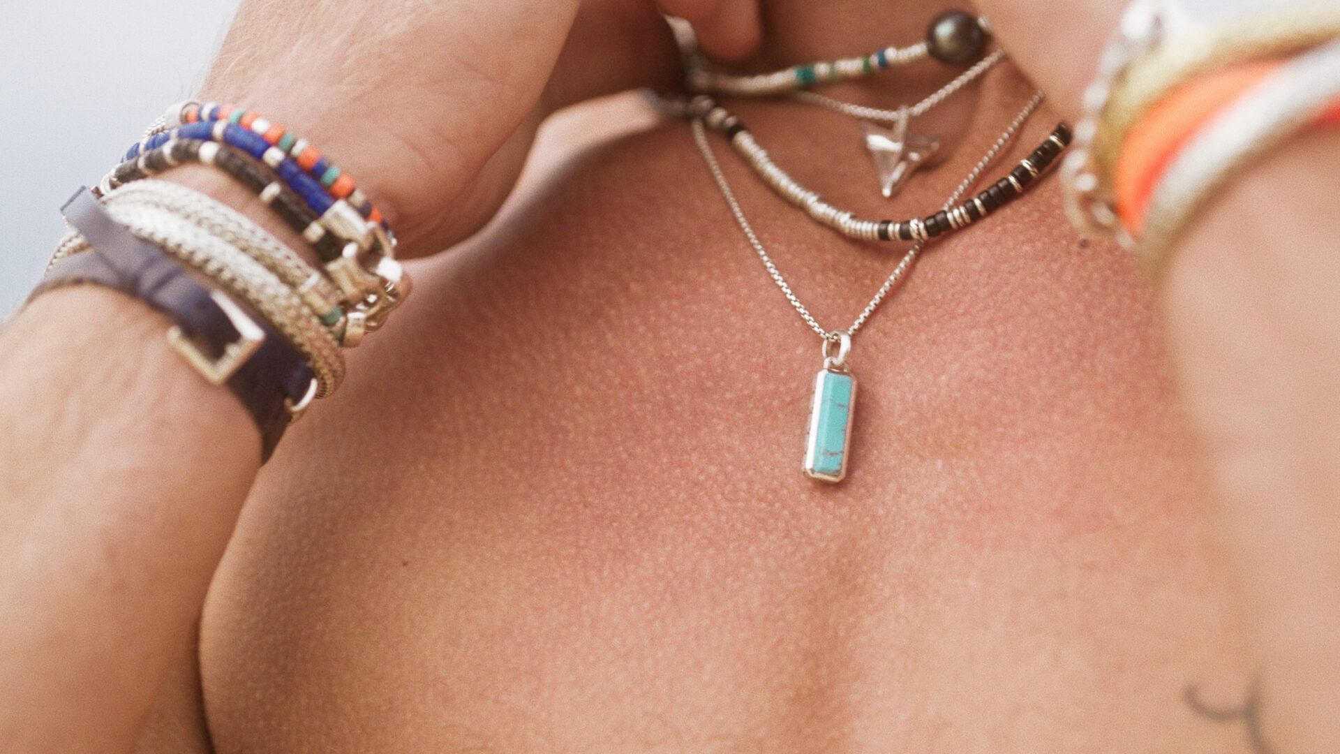 A close-up of John Hardy’s jewelry highlights the meticulous detail and sustainable materials that define the brand’s ethos.