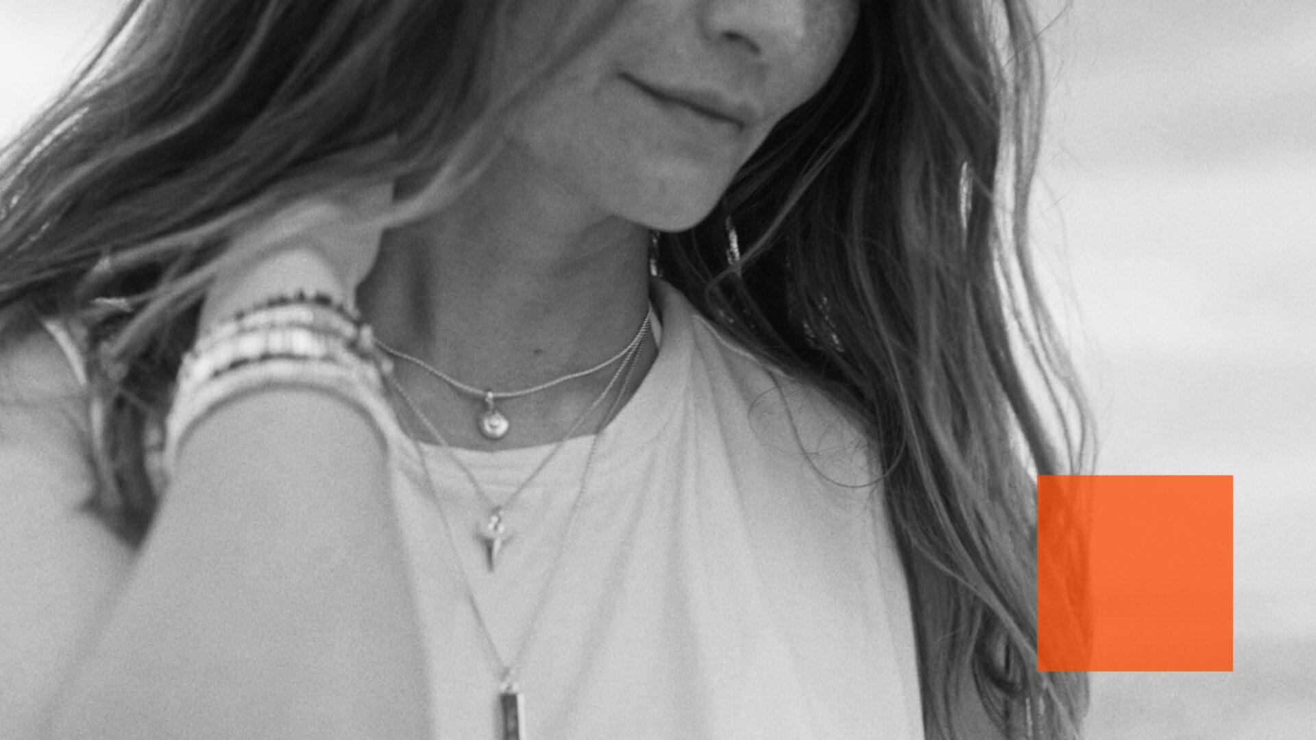 An intimate moment featuring John Hardy’s jewelry, emphasizing the brand’s dedication to handcrafted excellence and timeless style.